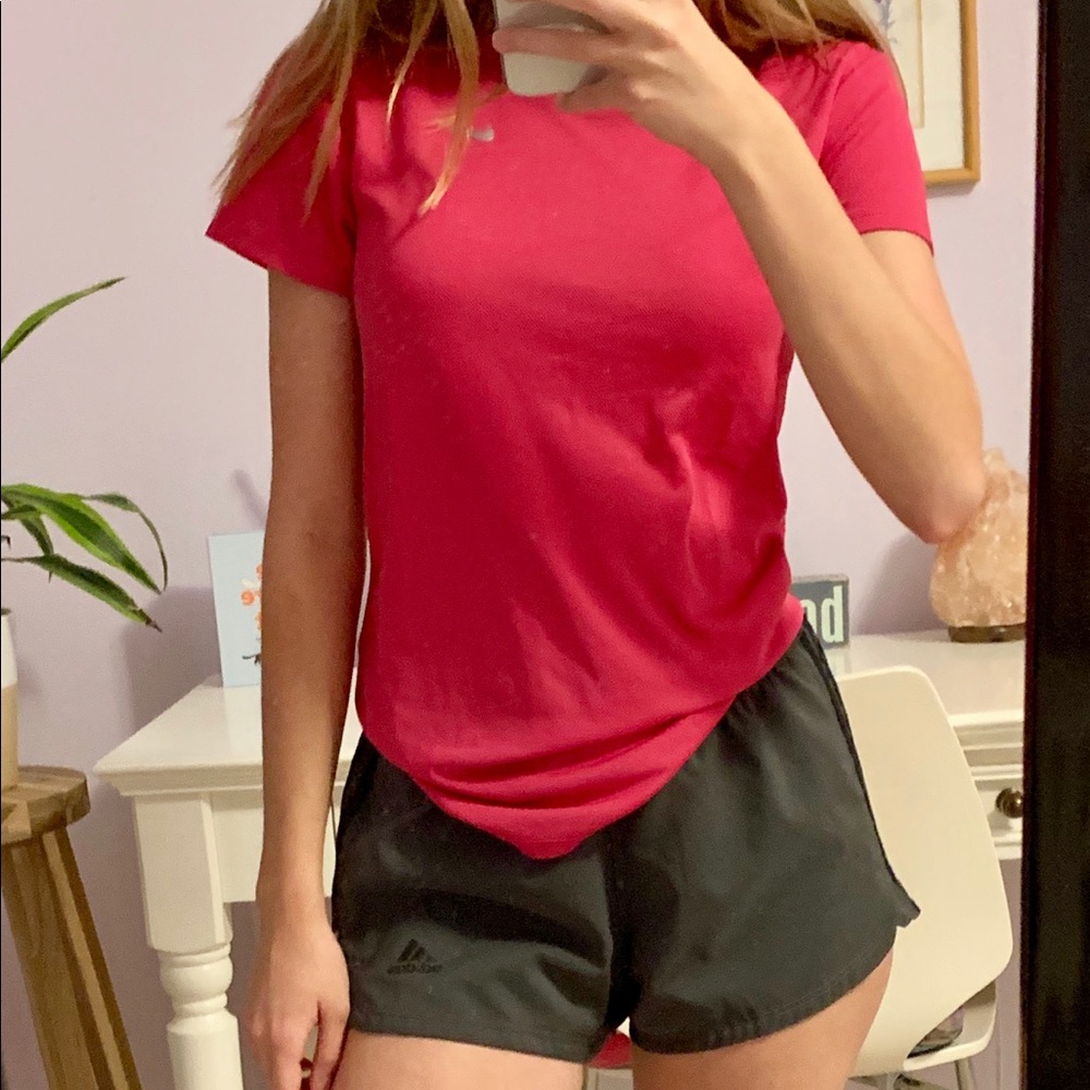 pink nike athletic shirt